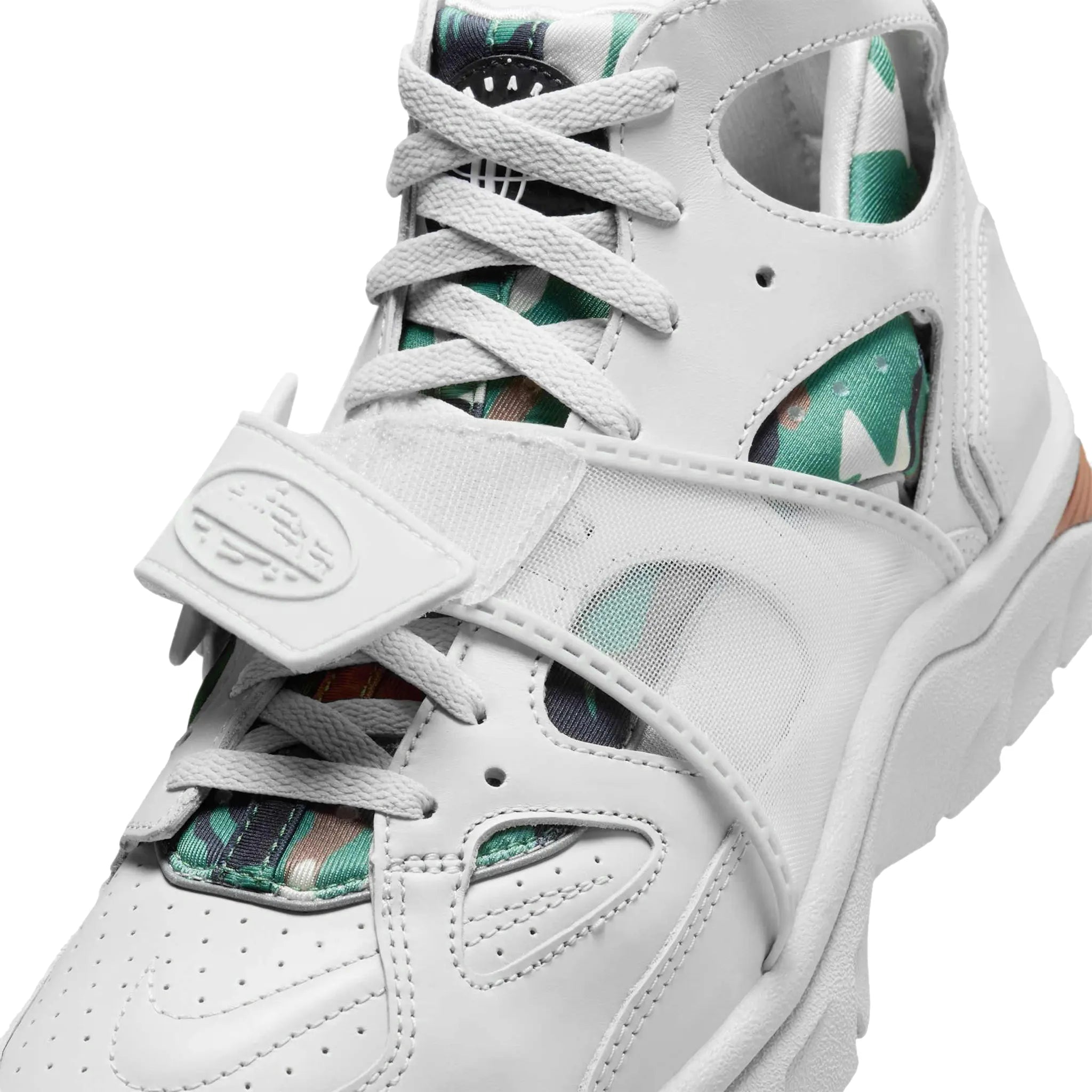 Tongue view of Corteiz x Nike Air Huarache Light Bone